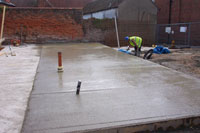 Installation of RC concrete slab for 2 new offices and public toilets inclusive of all ground works 230t muck away and 116m3 of concrete through a restricted width access off a major market town&rsquo;s market place