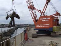 Our NCK Pennine crane lifting out 2no damaged jetty trestles caused by ship collision. Works also included fabrication and installation of 2no new 12&rdquo;x12&rdquo; greenheart timber trestles then full deck installation