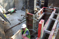 Installing basement to 5 storey water tower inclusive of underpinning tower to a depth of 3m below ground level and installing shuttering to multiple angles